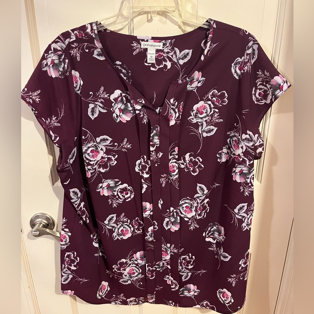 Purple floral, V-neck, cap sleeve blouse, pleated down the front.